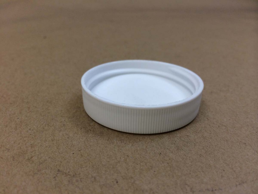     48 400 White  Ribbed Sides/Stipple Top  Plastic   Cap
