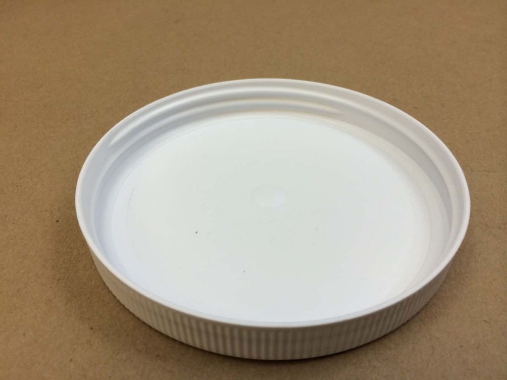     110 400 White  Ribbed Sides/Stipple Top  Plastic   Cap