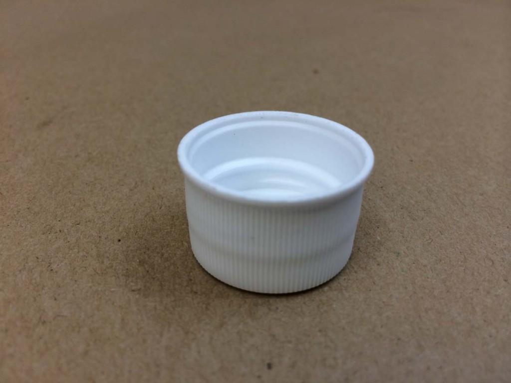     24 410 White  Ribbed Sides/Stipple Top  Plastic   Cap
