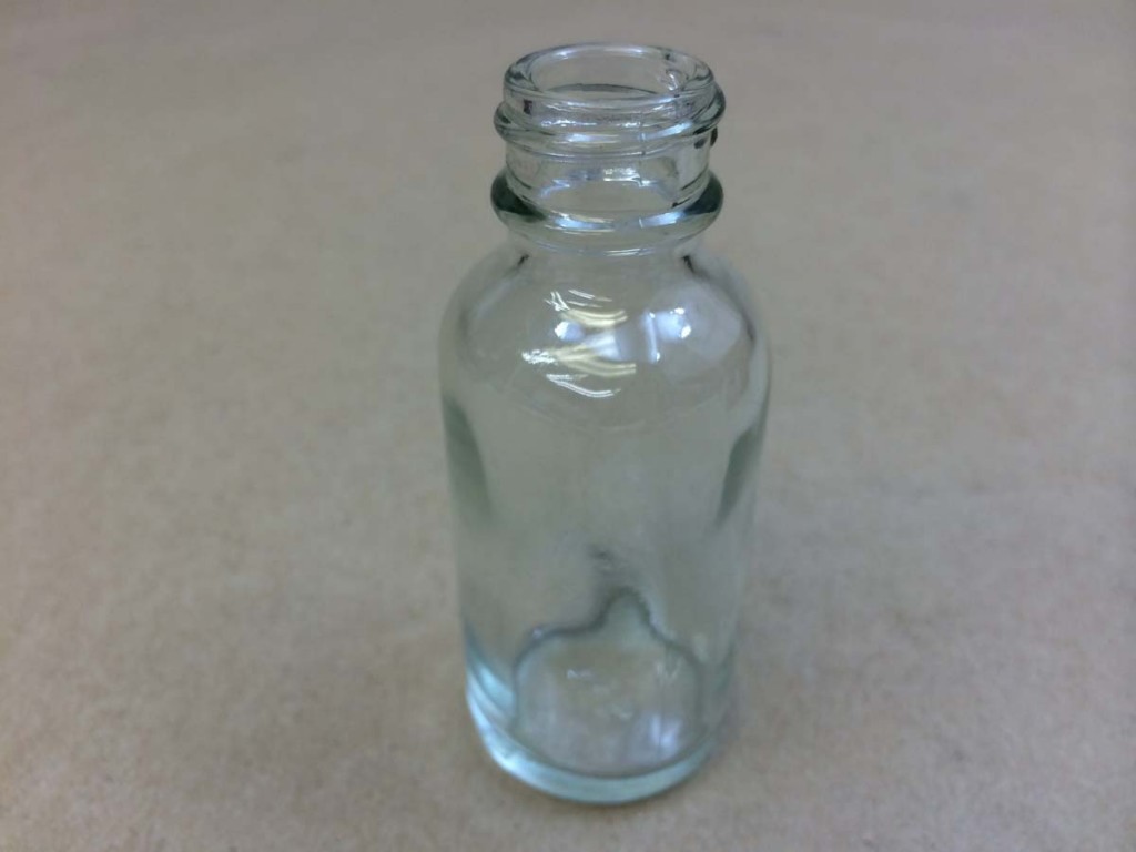  1 oz.   20 400 Flint/Clear  Boston Round  Glass   Bottle