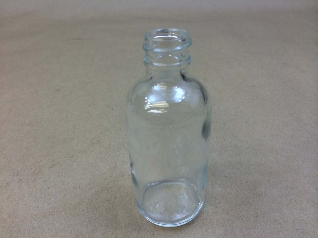  2 oz.   20 400 Flint/Clear  Boston Round  Glass   Bottle