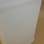 graduation marks on plastic jugs