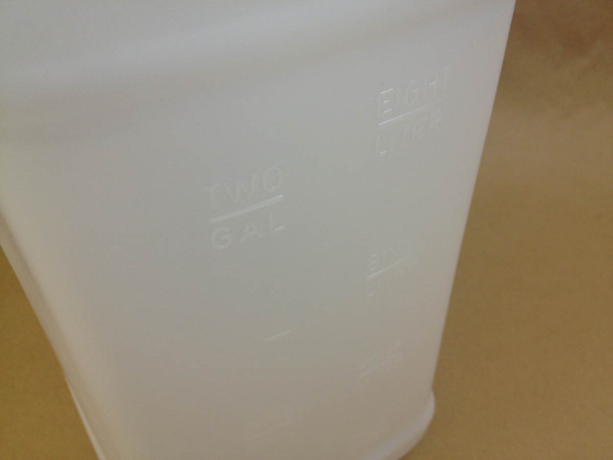 graduation marks on plastic jugs