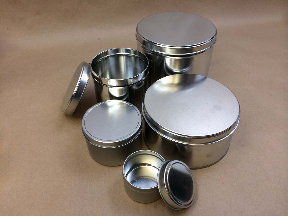 cookie tins, metal cans, holiday tins, ink can, slip cover cans.