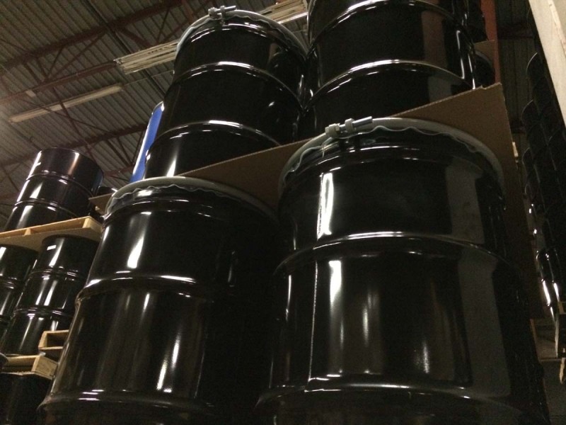 55 gallon OH steel drums with poly inserts in warehouse Yankee